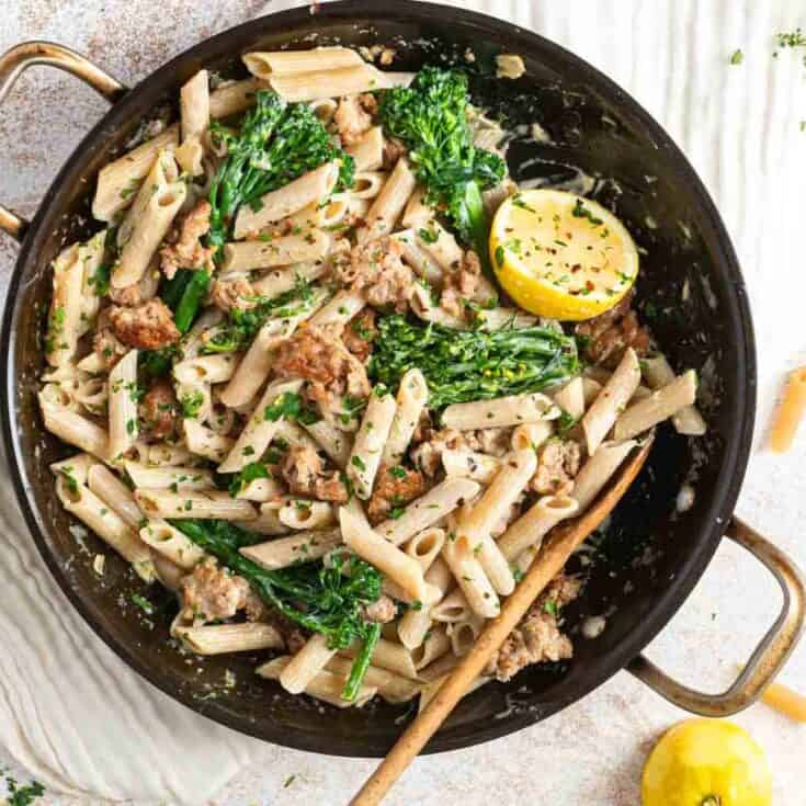 Pasta with ground meat, broccoli rabe, and lemon in a skillet, healthy Italian dish, The Olive Branch Nest.