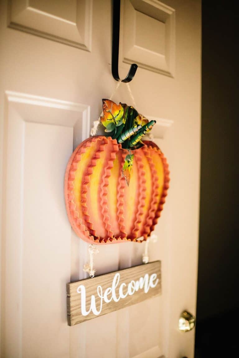 orange and brown wooden welcome door hanging decor