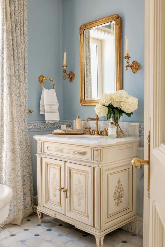 Elegant vintage bathroom vanity with gold accents and floral details.