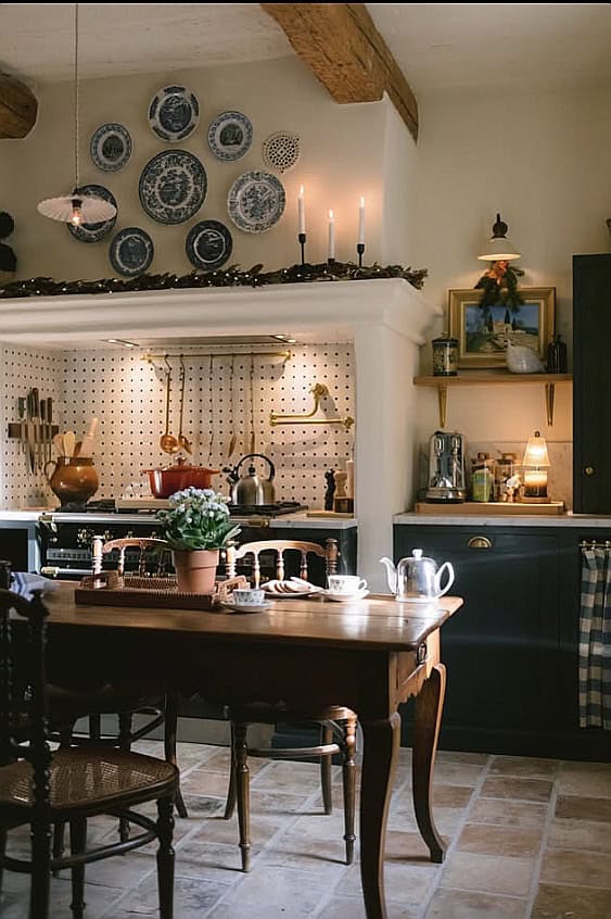 Charming farmhouse kitchen with vintage plates and cozy decor.