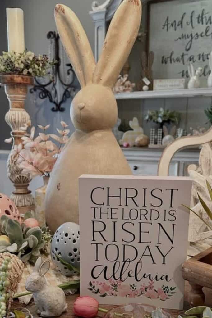 Bright Easter-themed decor with a wooden bunny, flowers, and seasonal accents.