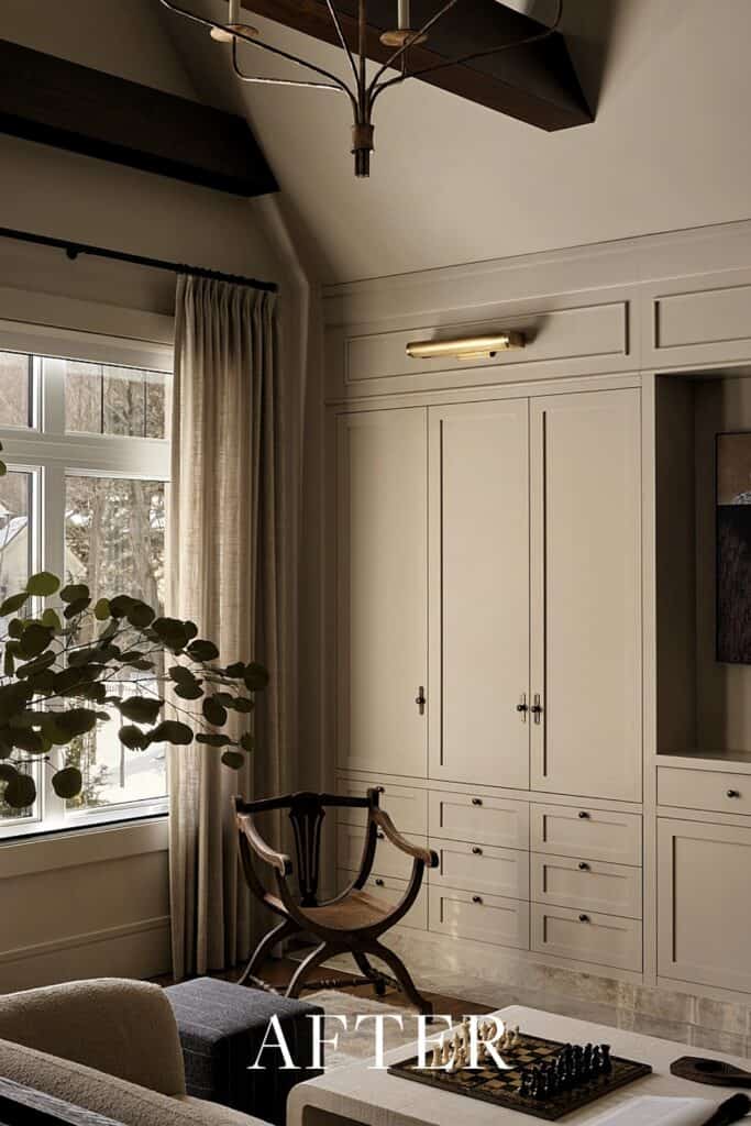 Built-in bedroom storage unit with ample drawers and cabinets for organization.