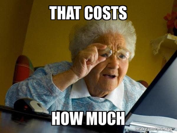 Older woman looking at a laptop with the caption "That costs how much".