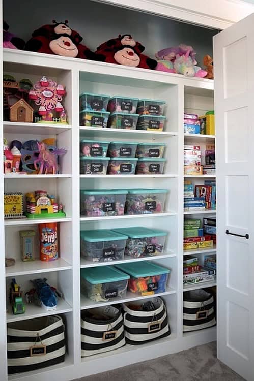 Organized playroom with built-in storage and colorful toys.