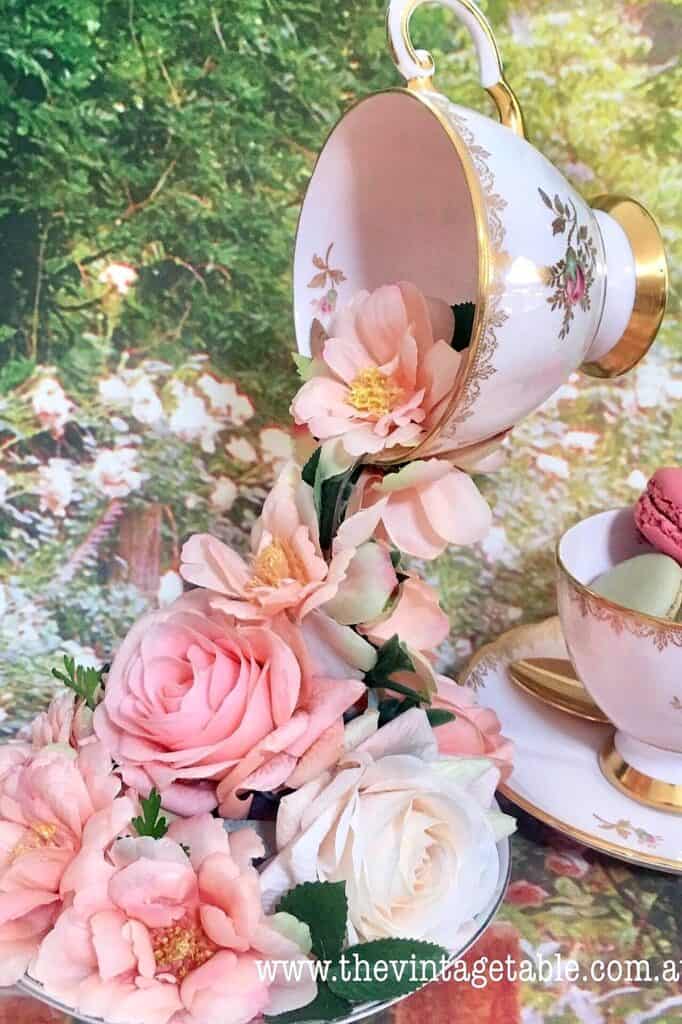 Beautiful vintage floral teacup with pink and white roses, perfect for tea parties.