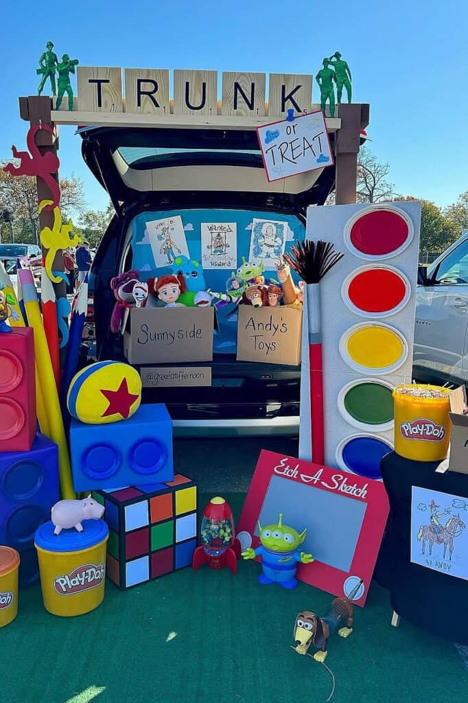 Toy Story themed trunk or treat setup with toys and decorations for kids.