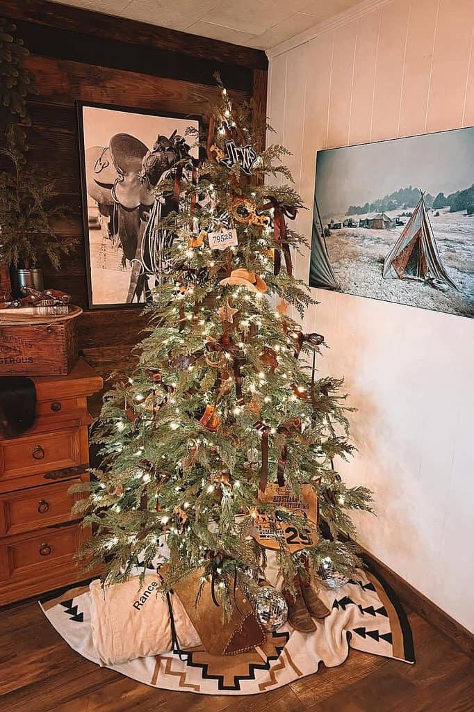 Decorated Christmas tree with rustic ornaments in cozy home setting.