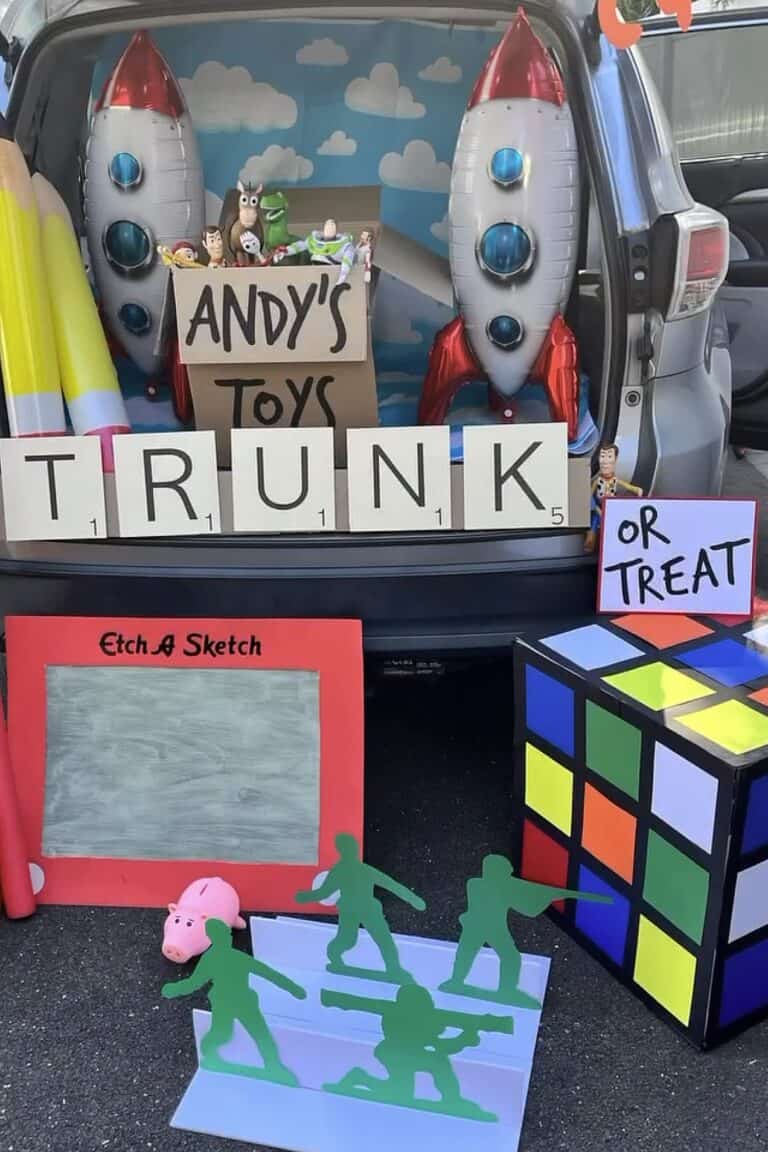 Toy Story themed trunk or treat with rockets, toys, and Rubik's Cube.
