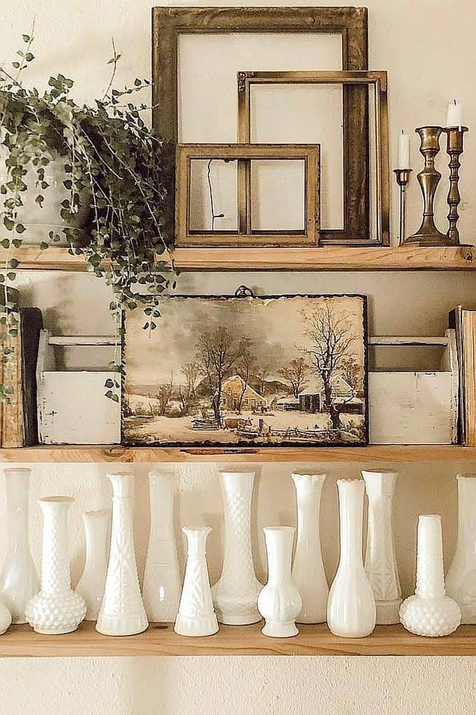 Elegant milk glass vases and vintage picture frames for home styling.