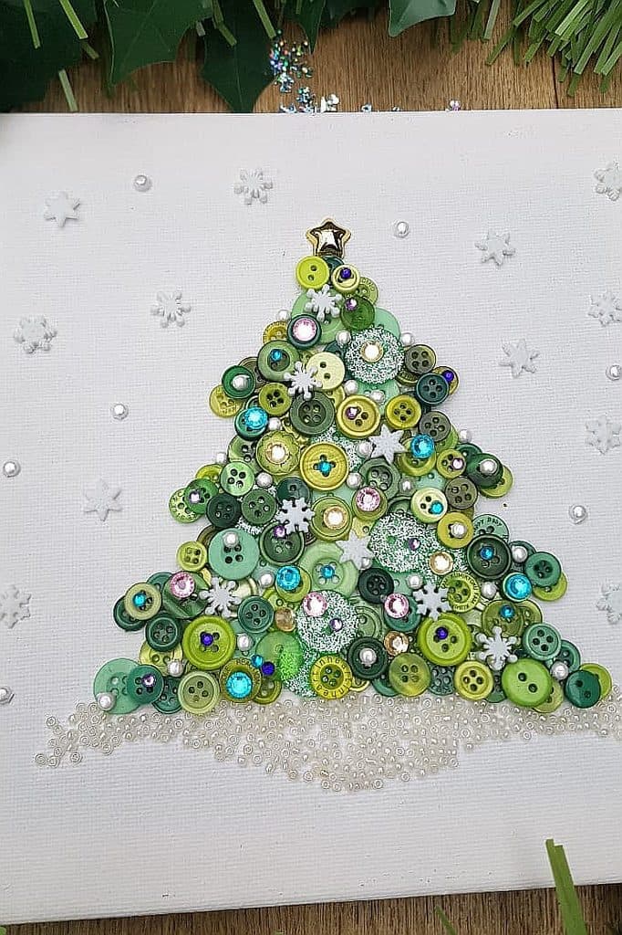 Creative Christmas tree made from green, white, and colorful buttons for holiday decor.