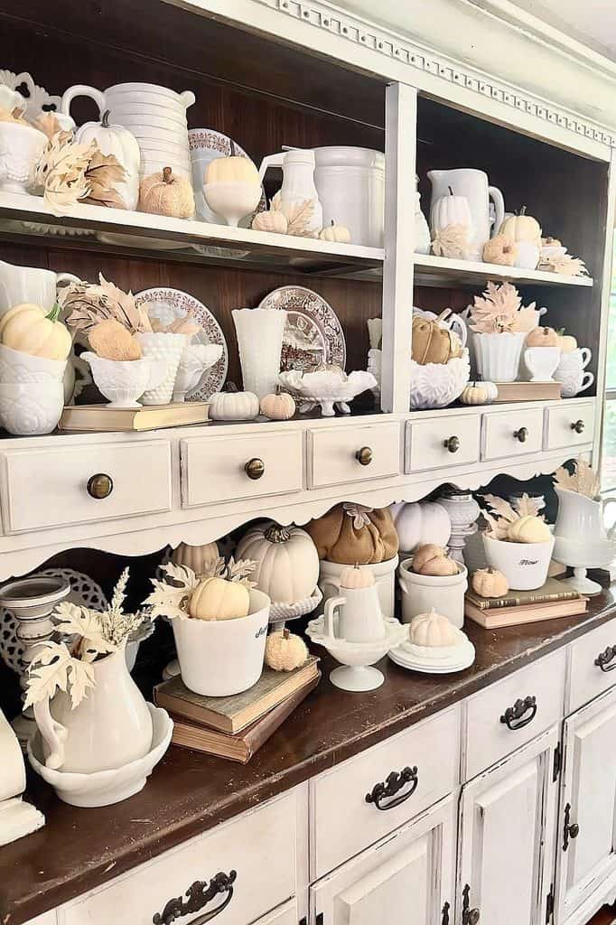 Elegant collection of milk glass vases and bowls for home styling.
